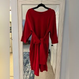 French terry shirt dress with sweatshirt sleeves ties at the waist.